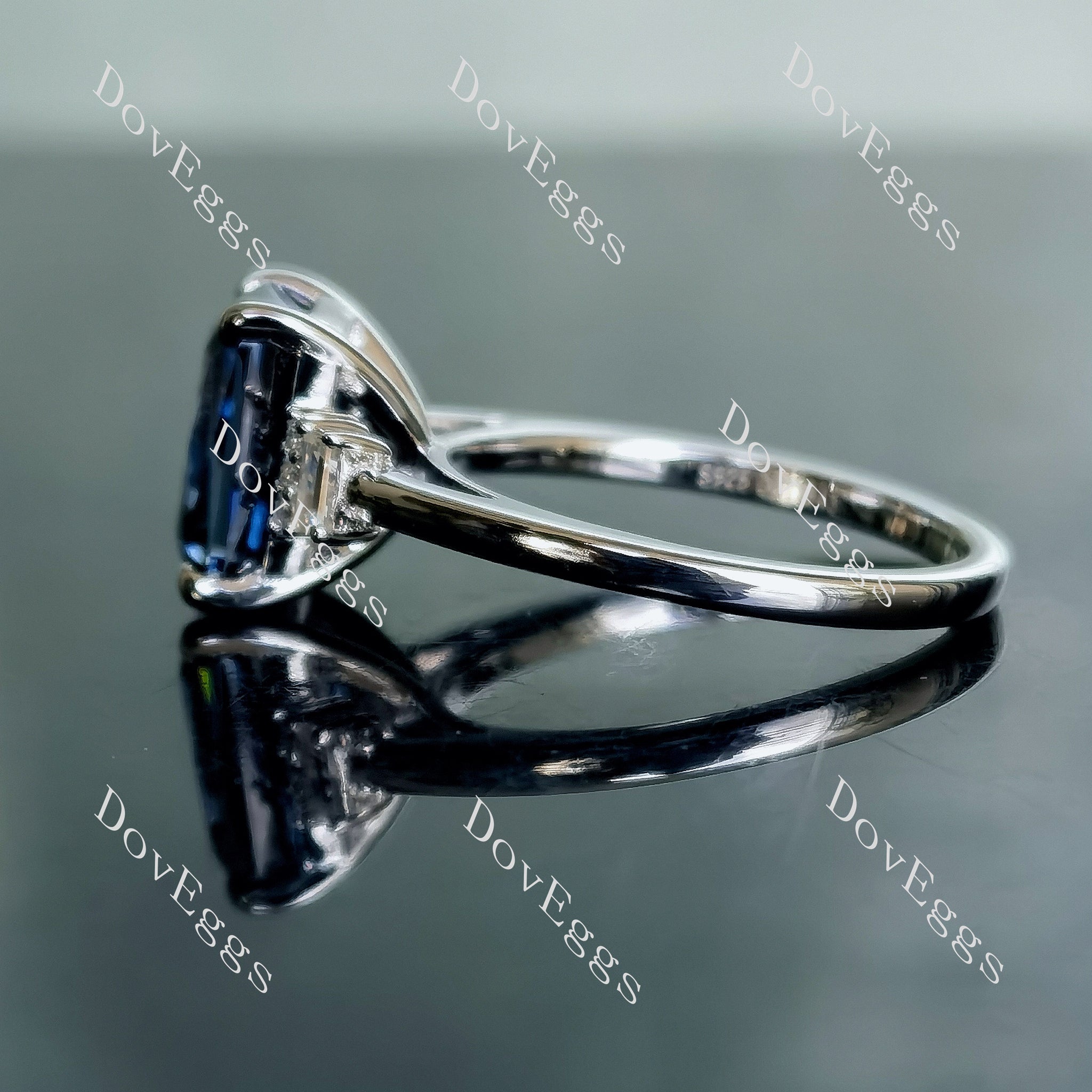 Doveggs criss cut side stone twilight blue moissanite engagement ring