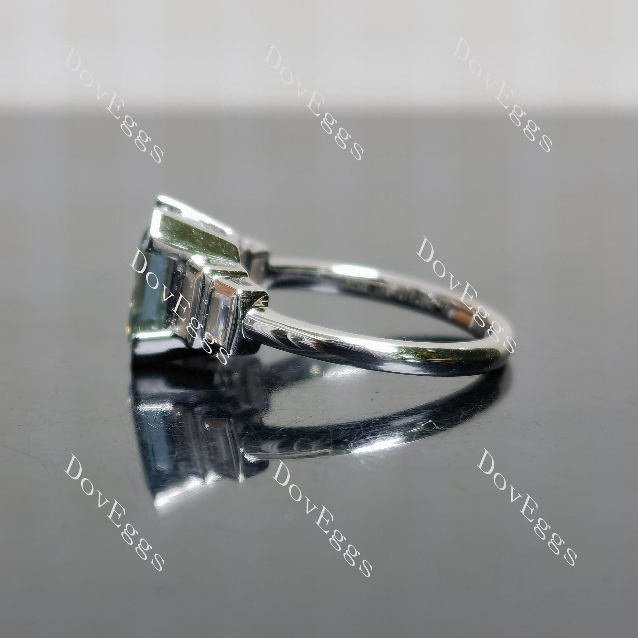 Doveggs emerald bezel side stones colored moissanite engagement ring