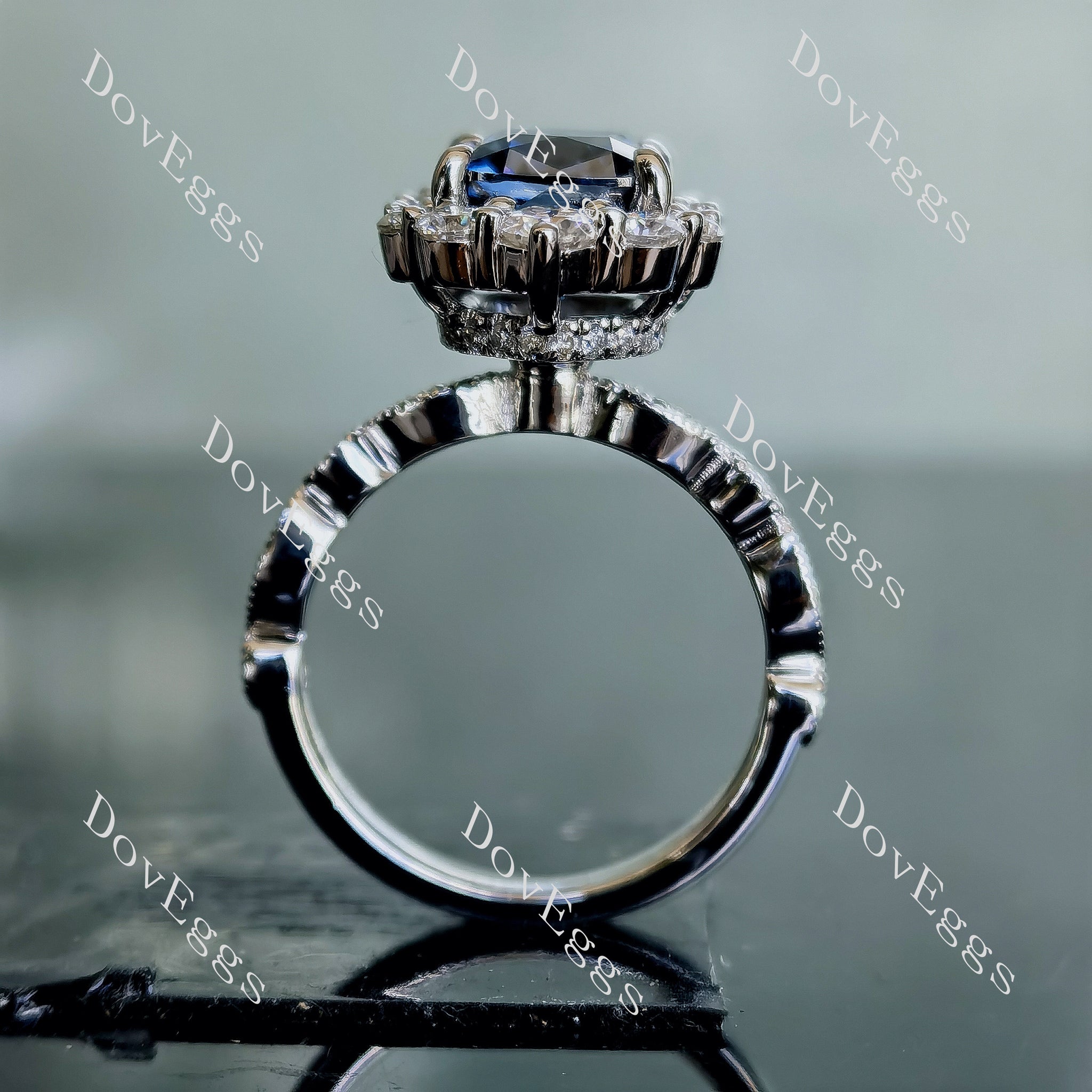 The Cristina cushion art deco halo twilight blue moissanite engagement ring