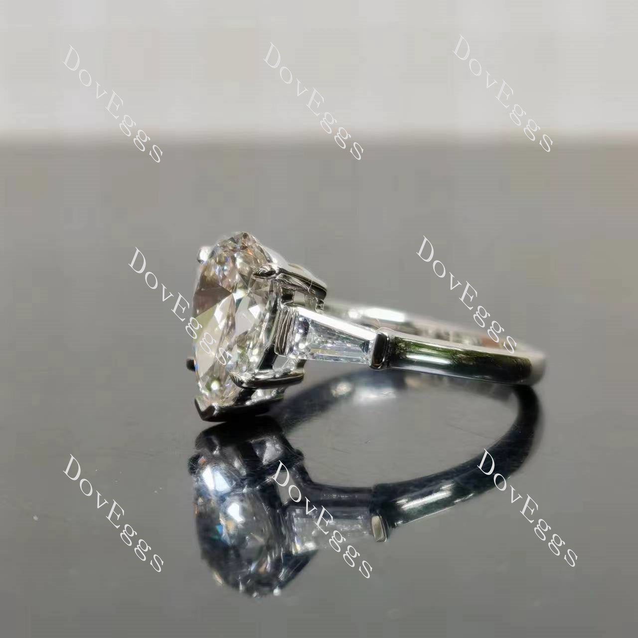 The Maddox pear three stones moissanite engagement ring