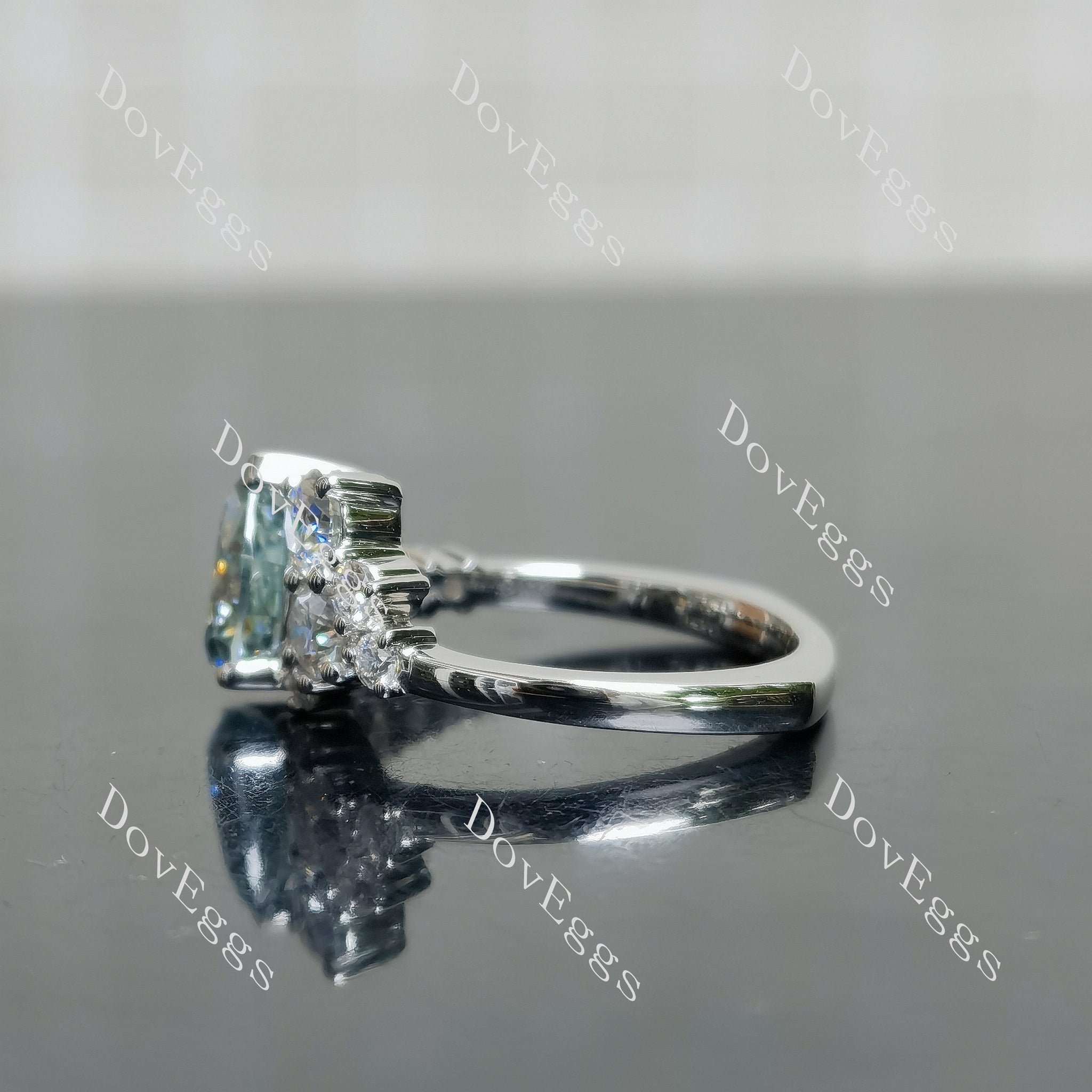 Doveggs pear side stones colored moissanite engagement ring