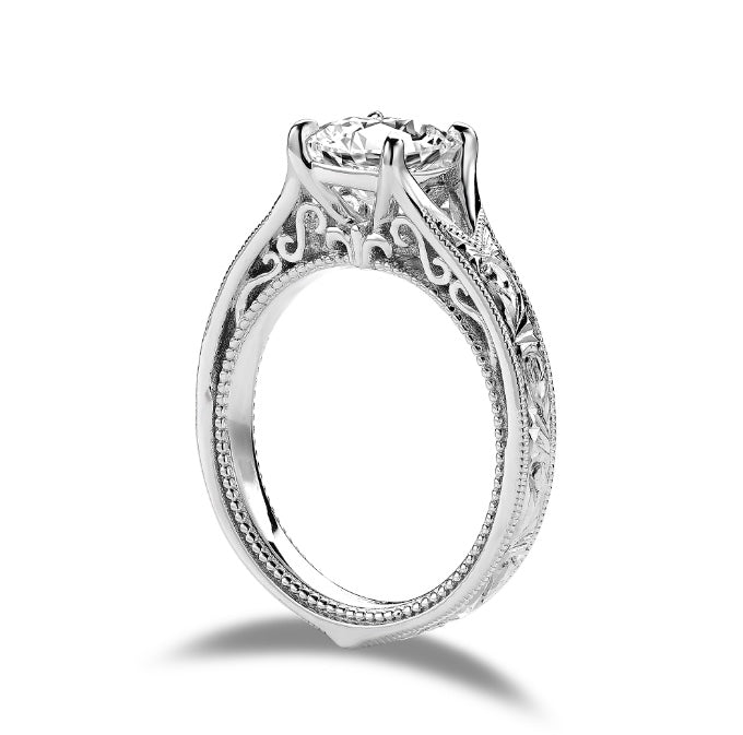 DovEggs hard engraved cushion moissanite engagement ring