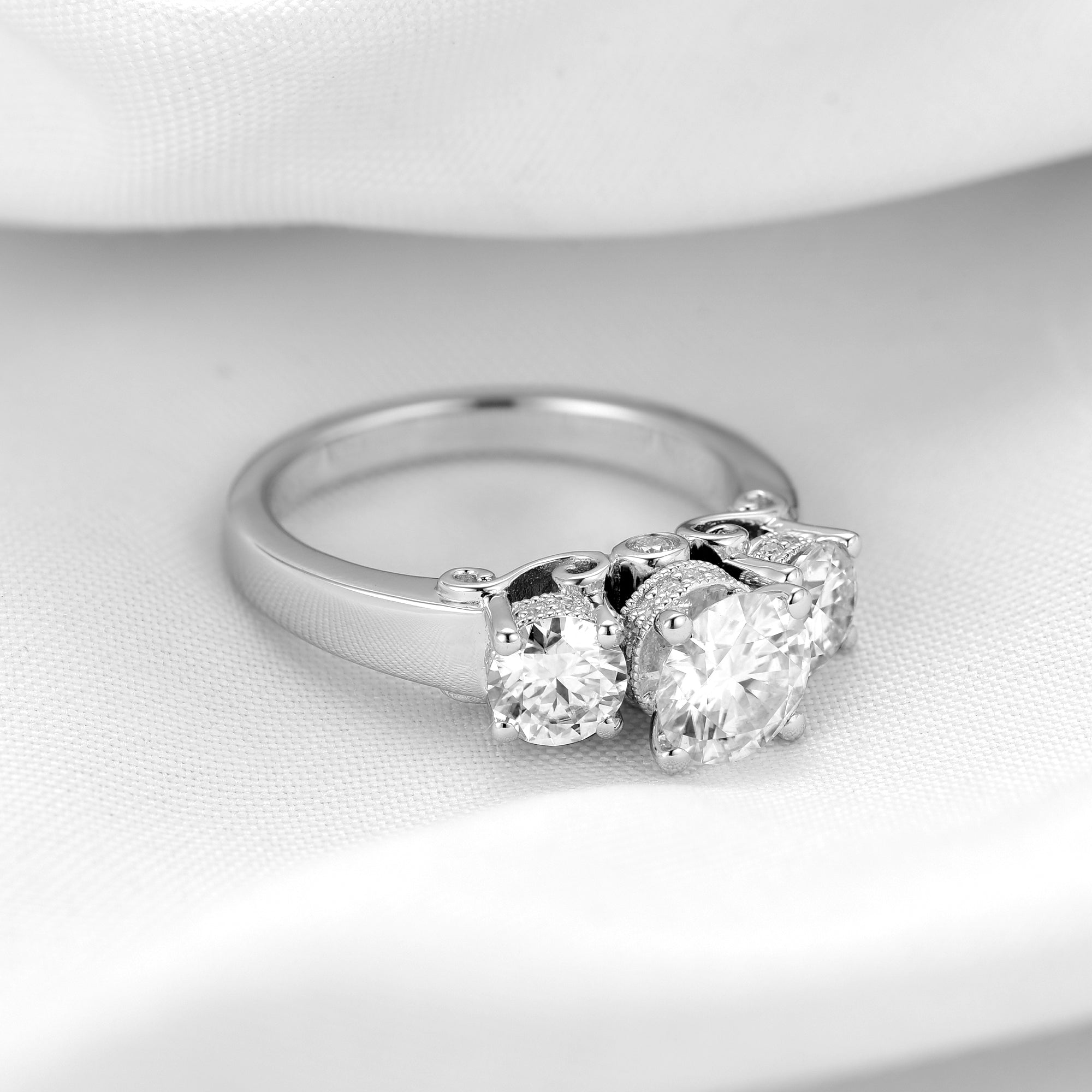 DovEggs sterling silver 2 carat three stone round moissanite engagement ring